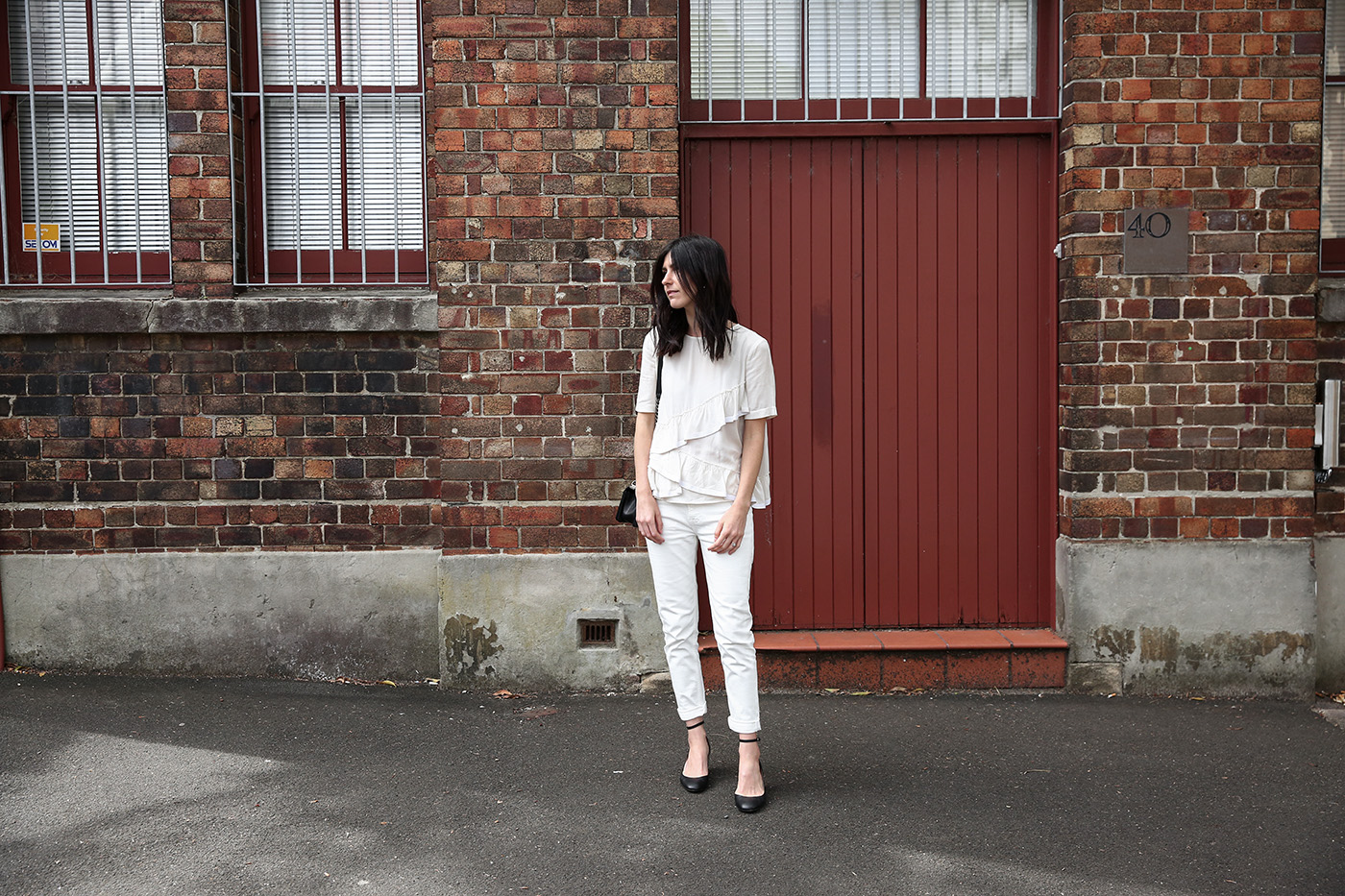 Wearing boyfriend jeans with a frill tee