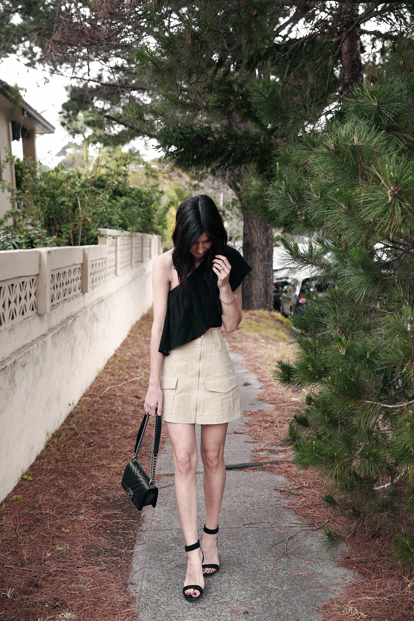 Wearing a one shoulder ruffle top