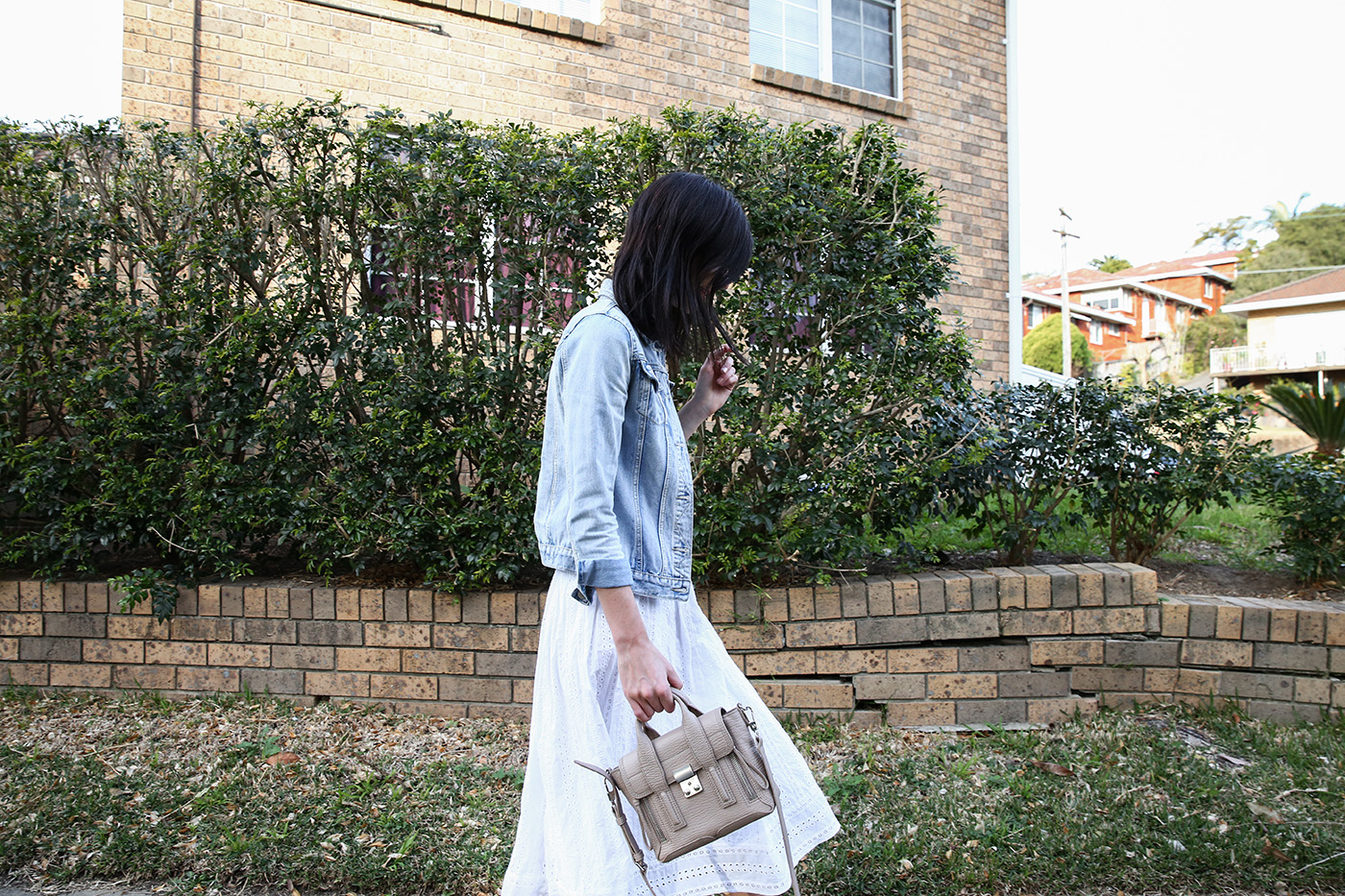 spring wardrobe essential midi skirt minimal mademoiselle