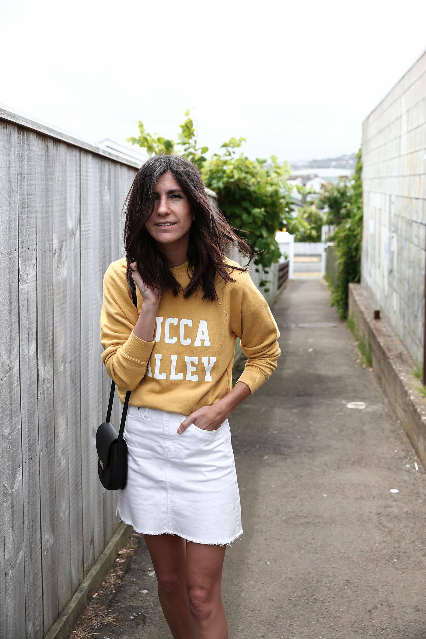 Mustard yellow shop and white outfit