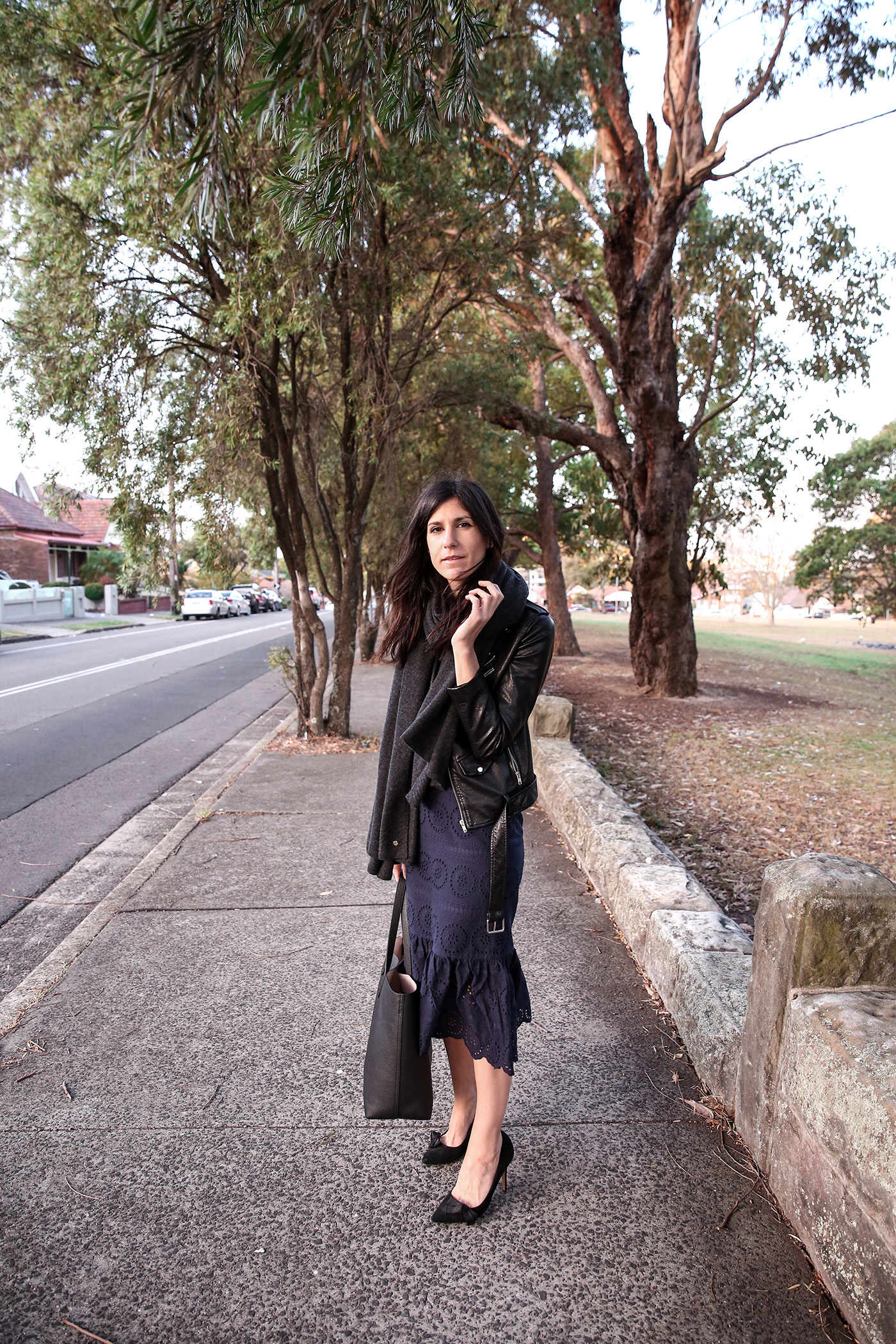 Workwear outfit wearing a navy broderie anglaise skirt for autumn and winter