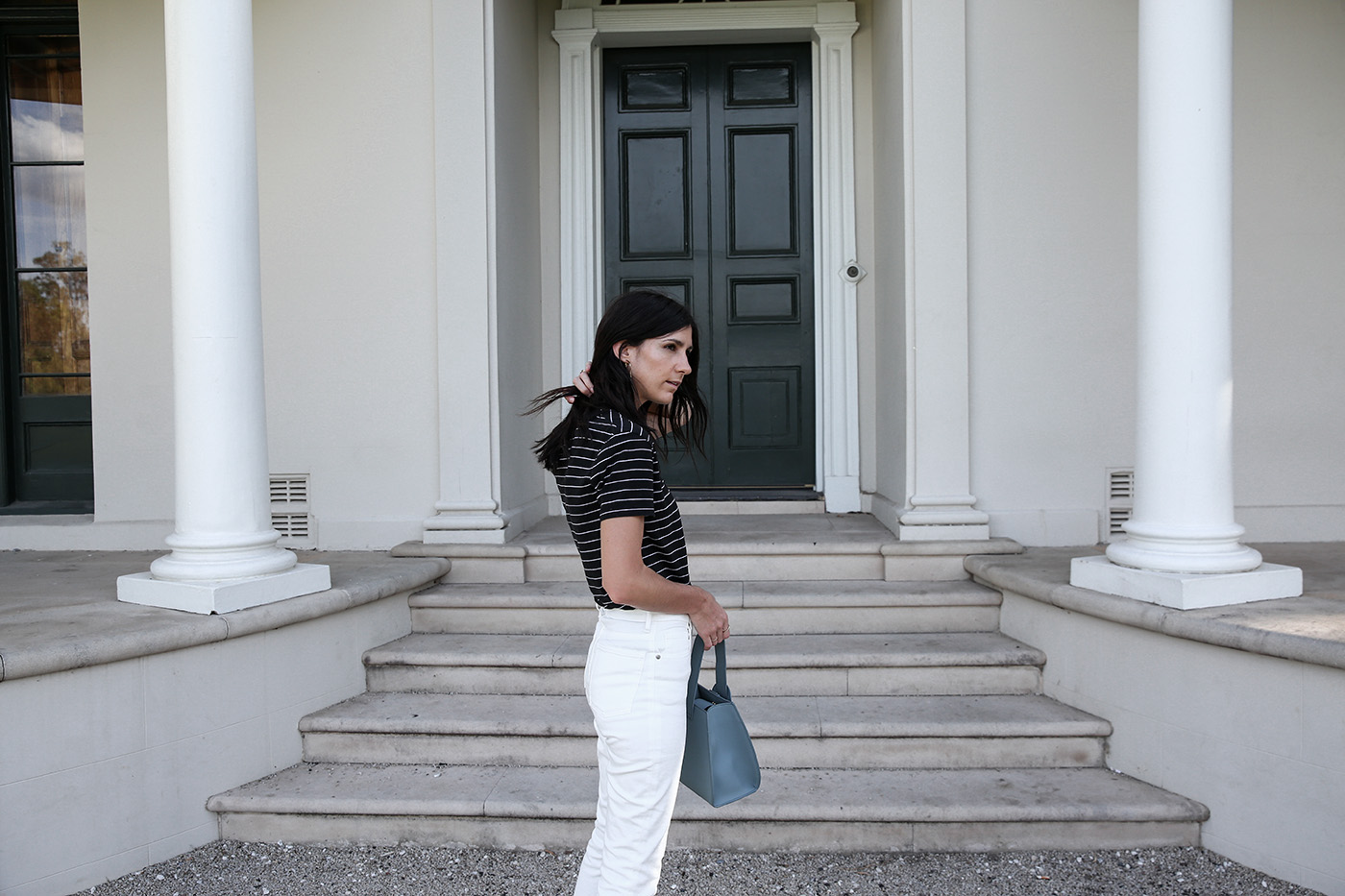 Outfit wearing pink trousers and a ruffle sleeve top