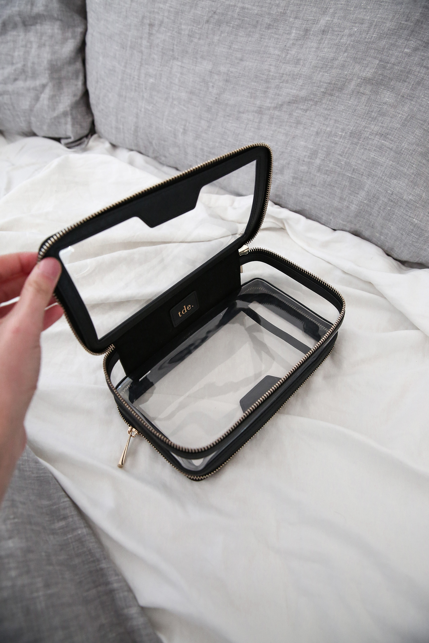 The Daily Edited Transparent Cosmetic Case vs. Anya Hindmarch