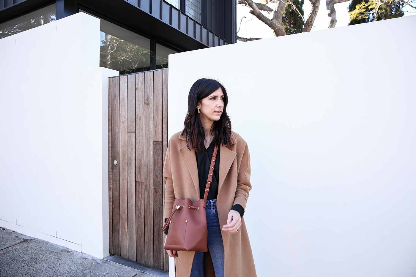 Minimal Outfit Wearing Silk Wrap Blouse, Mom Jeans and a Cashmere Wool Coat