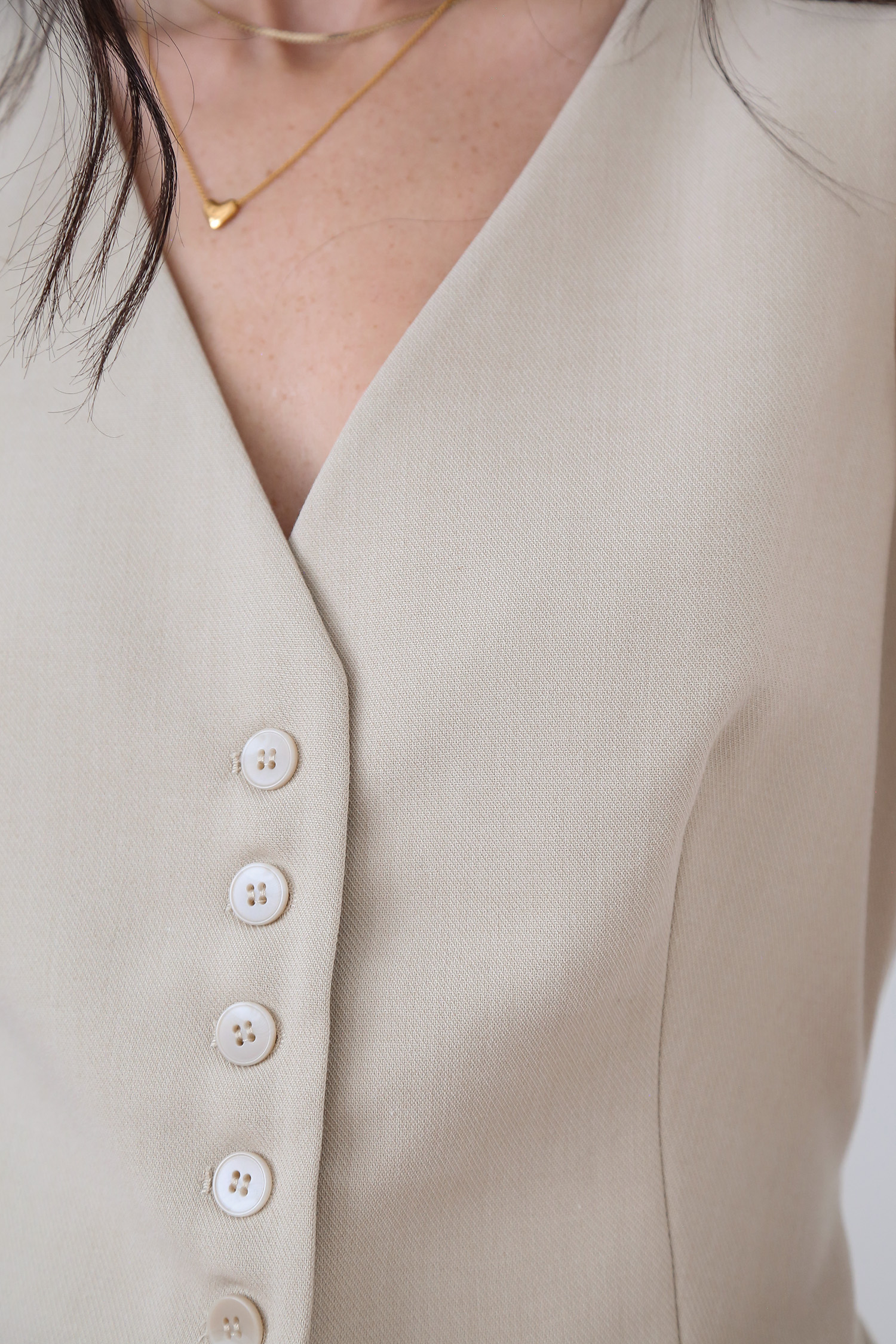 Longline waistcoat trend neutrals button detail