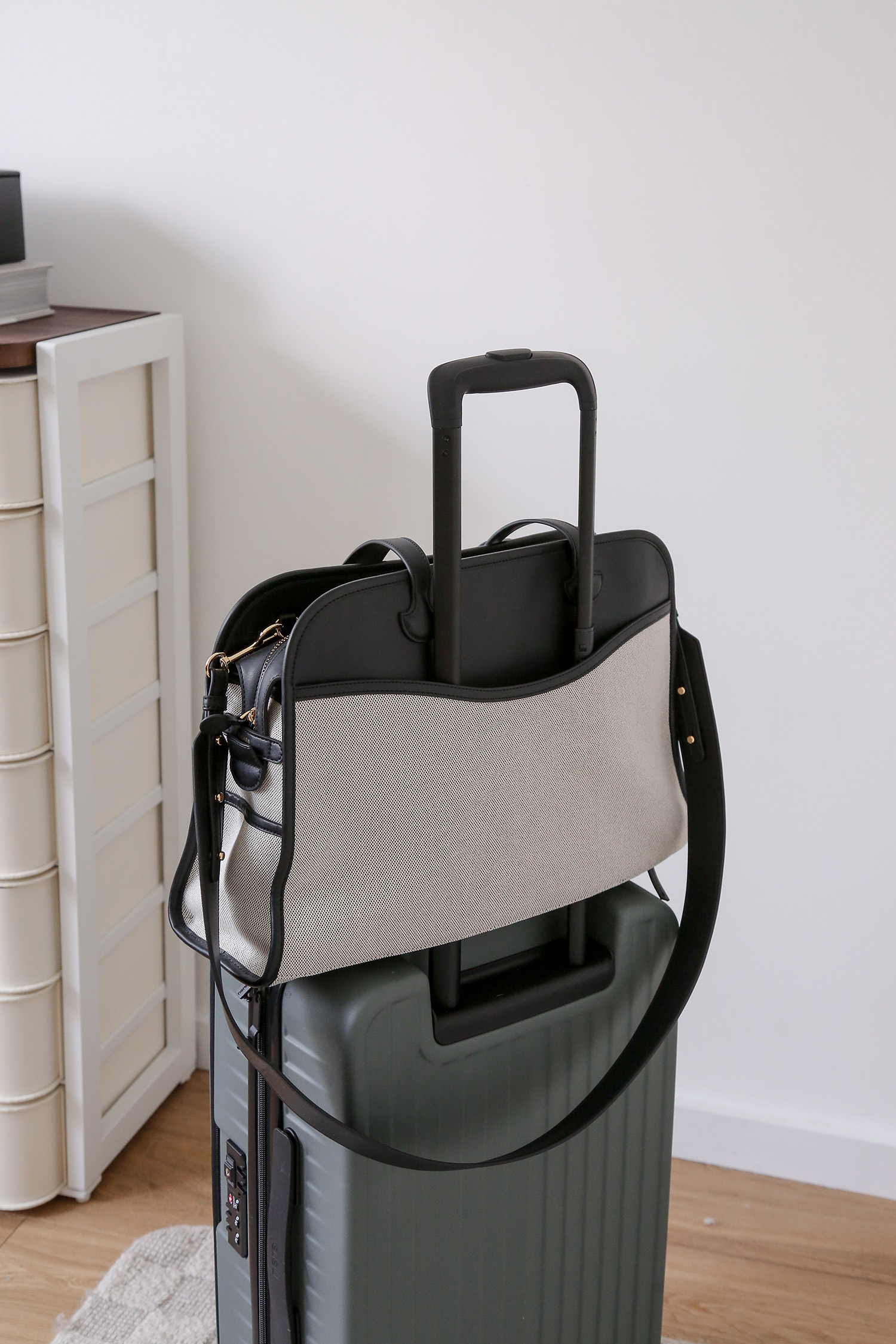 Workwear bag with pass through detail