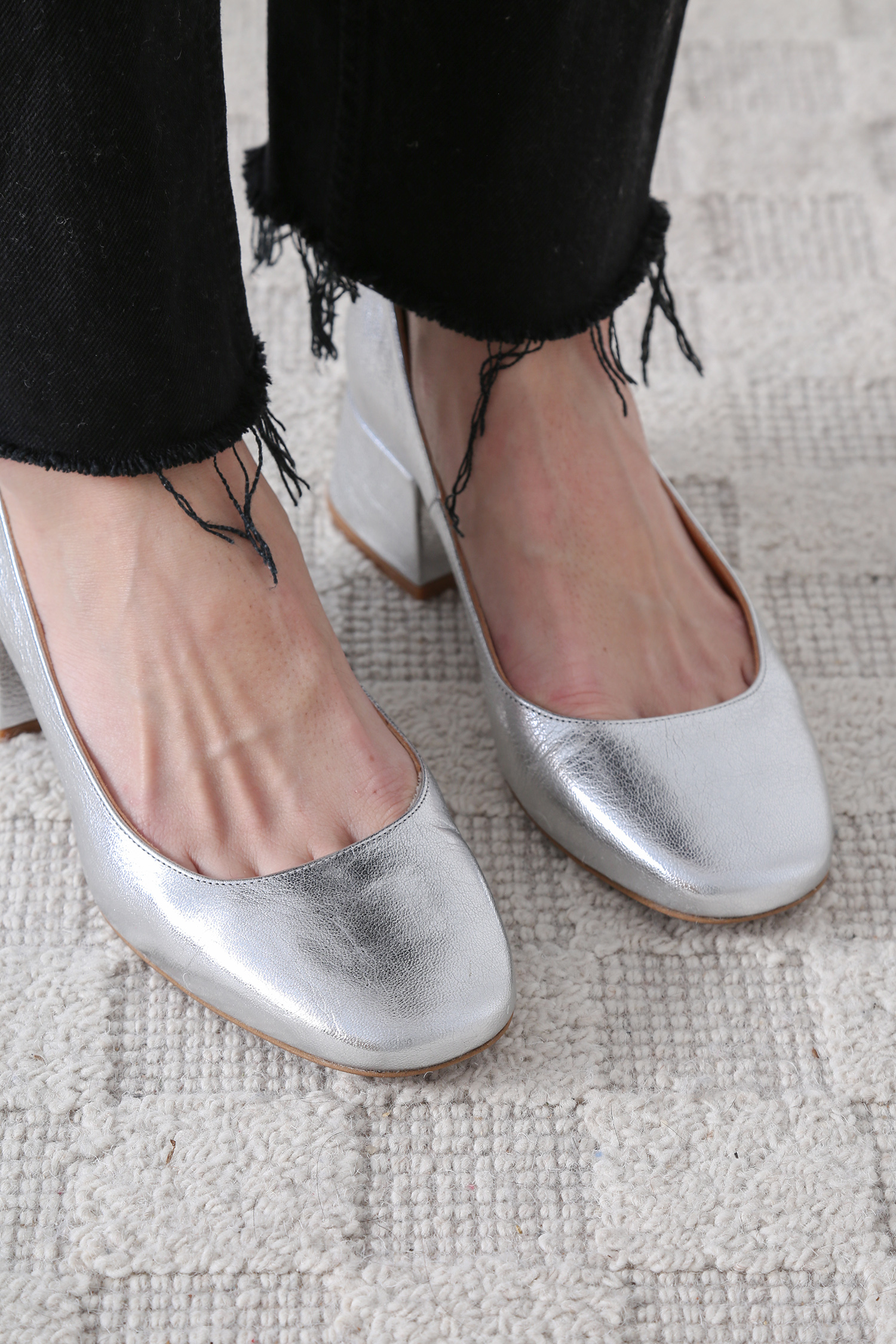 silver low heeled shoes