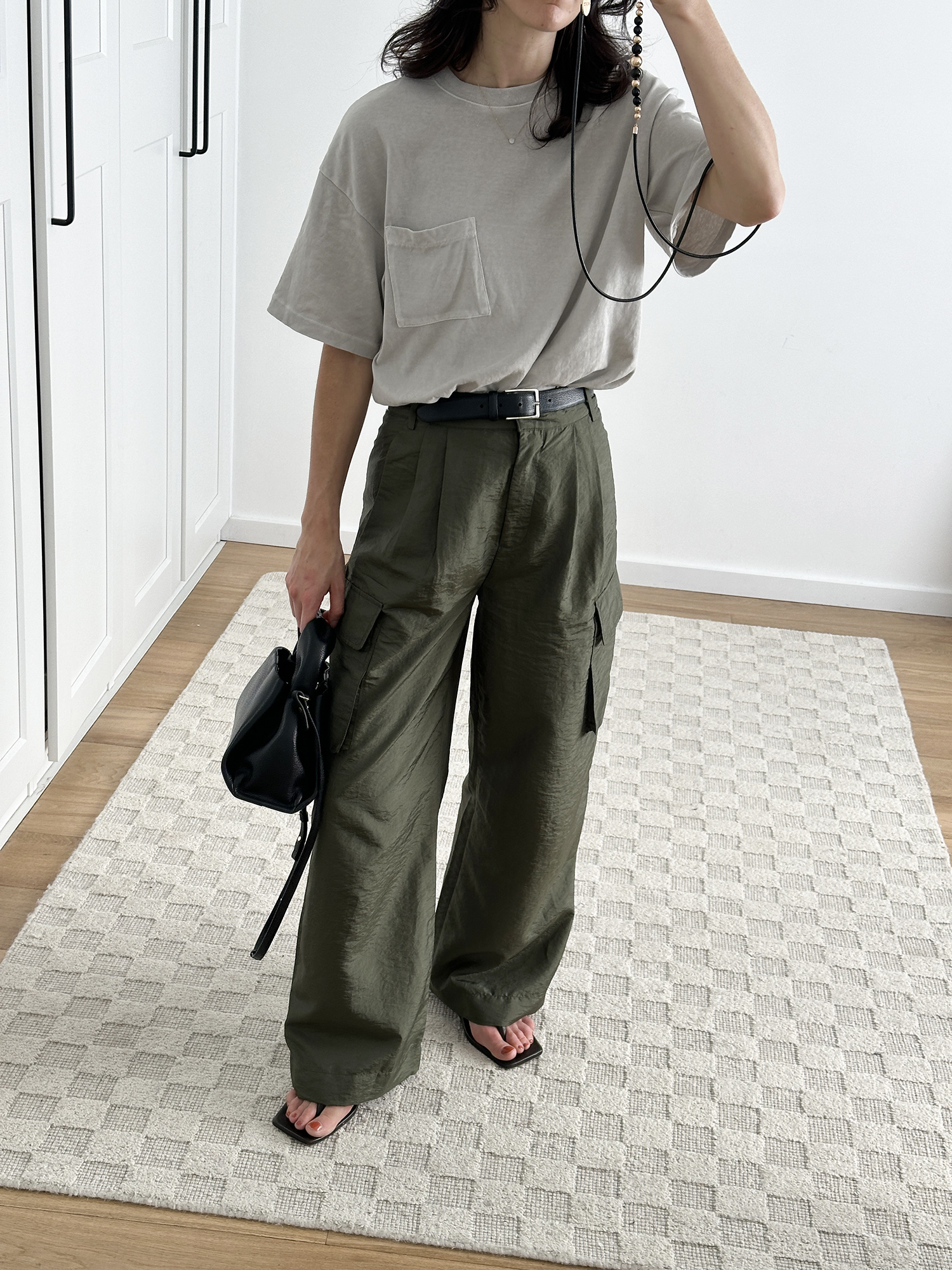 Casual outfit idea wearing Tibi Stella cargo pants and Madewell oversized tee no color color