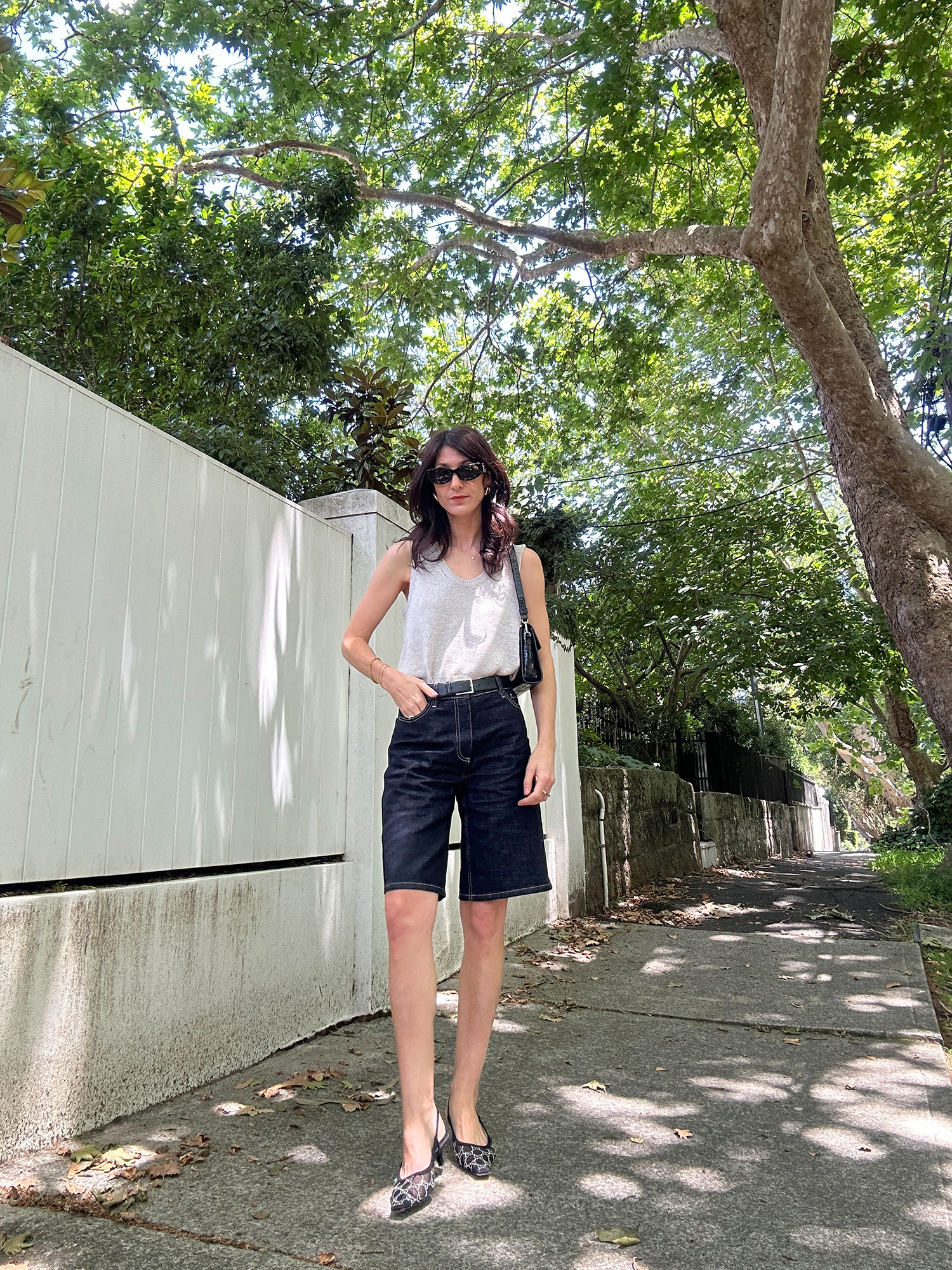 spring outfit with denim Bermuda shorts