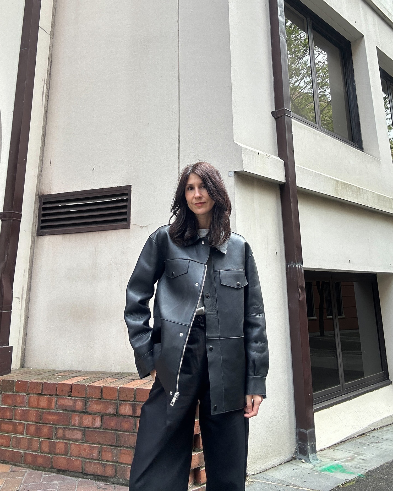 Minimal style outfit wearing oversized leather jacket