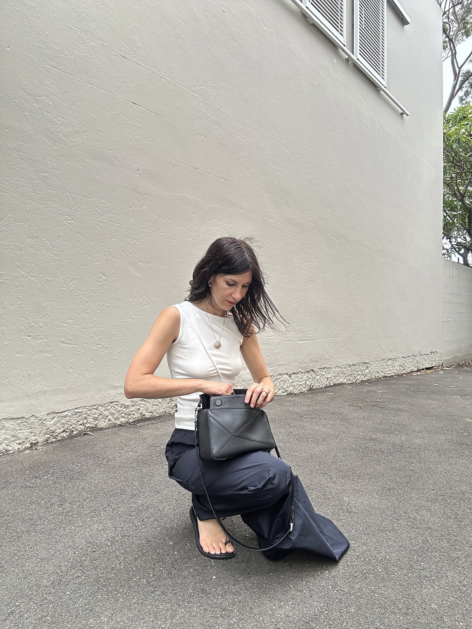 Minimal Outfit wearing Loewe Puzzle Bag Dupe