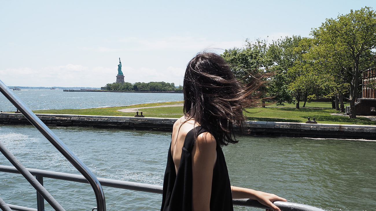USA new york travel guide statue of liberty karen walker dress